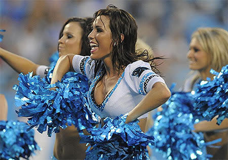 Carolina Panthers cheerleaders perform during the first half of a preseason NFL football game against the Buffalo Bills.