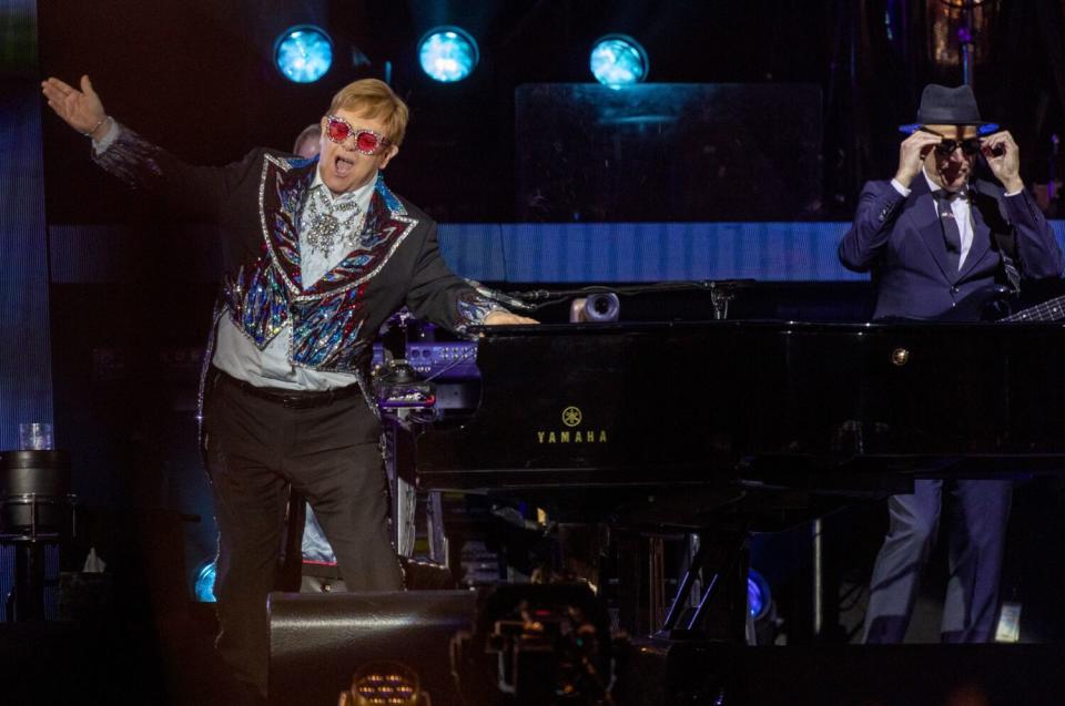 Elton John performs in concert