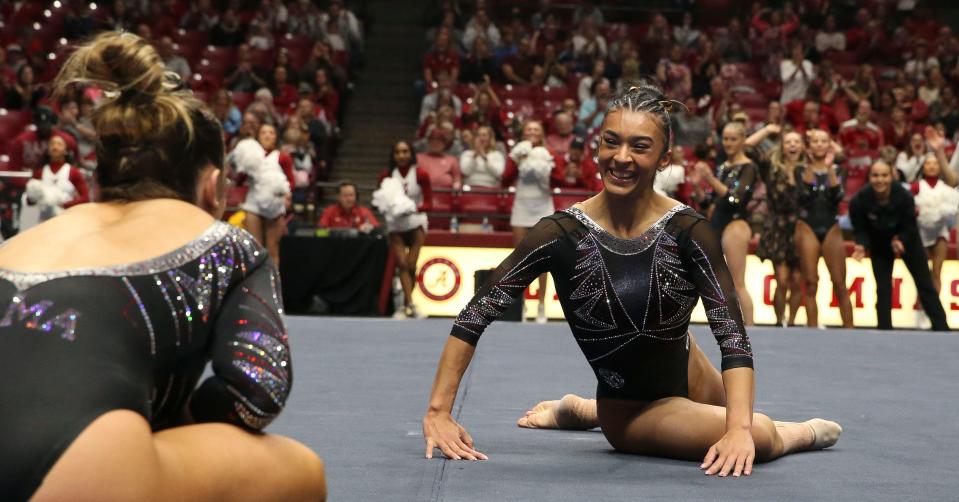Feb.2, 2024; Tuscaloosa, Alabama, USA; Alabama gymnast Luisa Blanco smiles at Alabama gymnast Lilly Hudson after completing her floor routine during Alabama’s gymnastics meet with Kentucky Friday in Coleman Coliseum. Kentucky got their first win ever in Tuscaloosa 197.525 to 196.850.