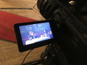 <p>Yahoo Global News Anchor Katie Couric and Olympic gold medalist Simone Biles are onscreen on the LCD of a video camera during an interview at John’s Pizzeria in New York City on Nov. 18. (Gordon Donovan/Yahoo News) </p>