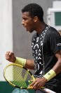 Canada's Felix Auger-Aliassime reacts as he plays Serbia's Filip Krajinovic during their third round match of the French Open tennis tournament at the Roland Garros stadium Friday, May 27, 2022 in Paris. (AP Photo/Michel Euler)