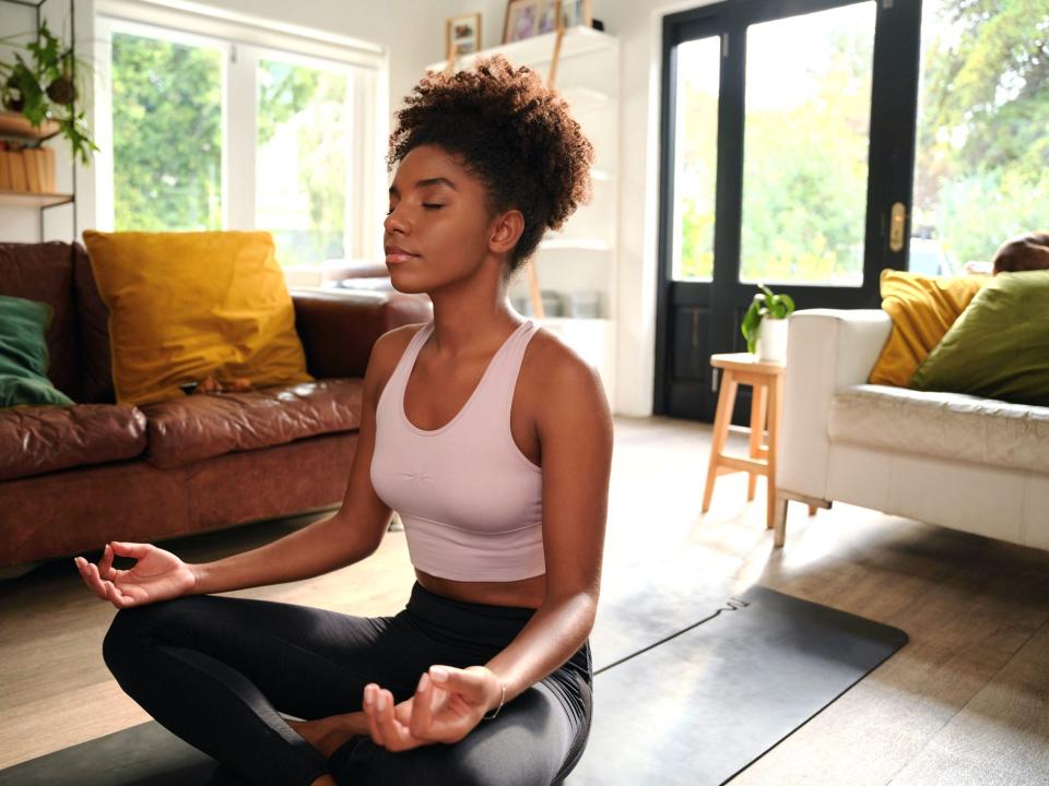 black woman meditating