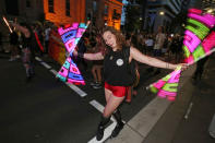 <p>A woman twirls lights as members of the gay community and their supporters celebrate the result of a postal survey calling for gay marriage right in Sydney, Australia, Wednesday, Nov. 15, 2017. (Photo: Rick Rycroft/AP) </p>