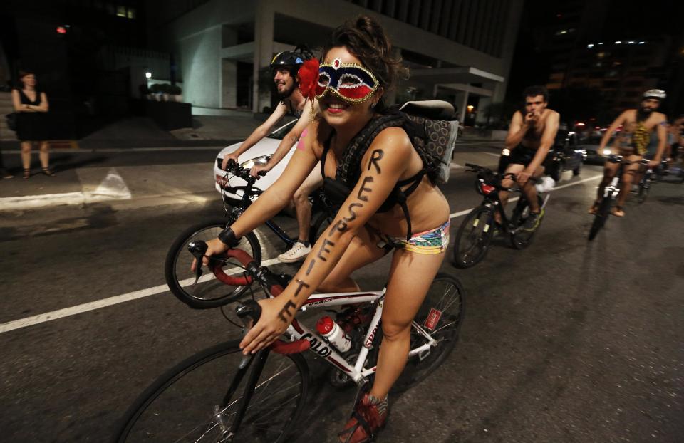 Cyclists take part in the "World Naked Bike Ride" on Sao Paulo&ap...