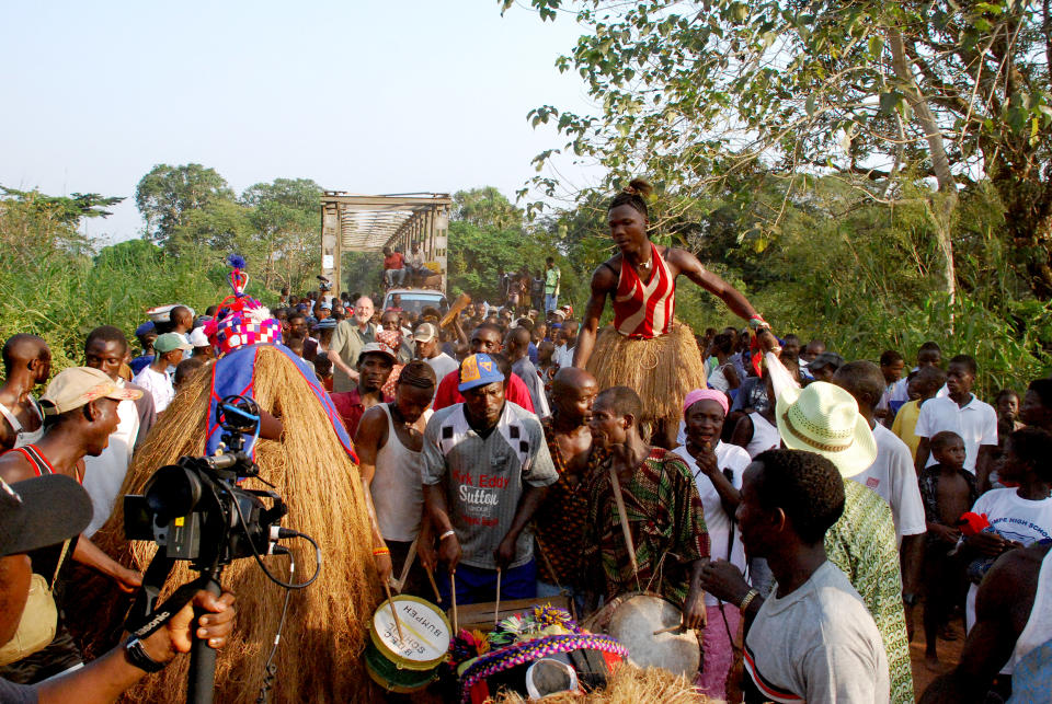 The Bumpe community celebrating the arrival of Sarah Culberson with her adoptive parents in Sierra Leone in 2006. (Courtesy Sarah Culberson)