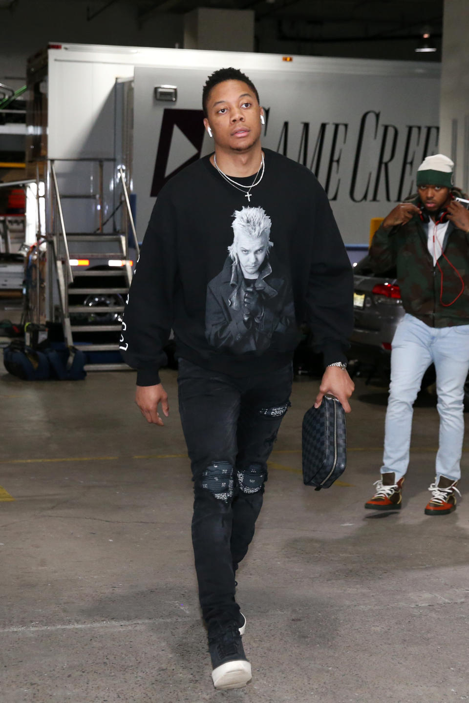 <p>Tim Frazier wears a “Lost Boys” sweater ahead of the Bucks, Nets game at the Barclays Center on April 1. </p>
