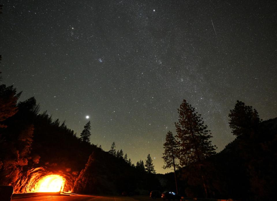 streaks of light in the starry night sky