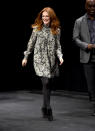 <p>Julianne Moore took to the stage to talk about her new film “Demolition” in a floral turtleneck swing dress, black tights, and black booties.</p>