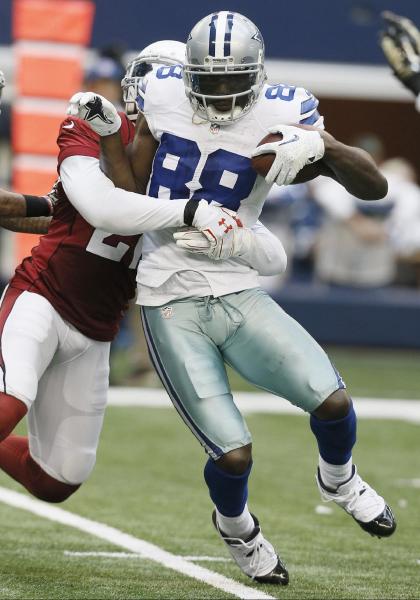 Arizona's Patrick Peterson helped bottle up Dez Bryant. (AP) 