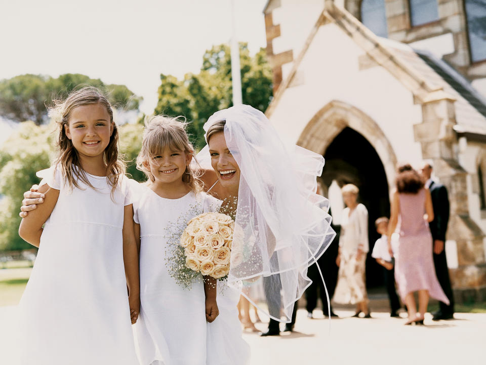 Bride with bridesmaids wearing white