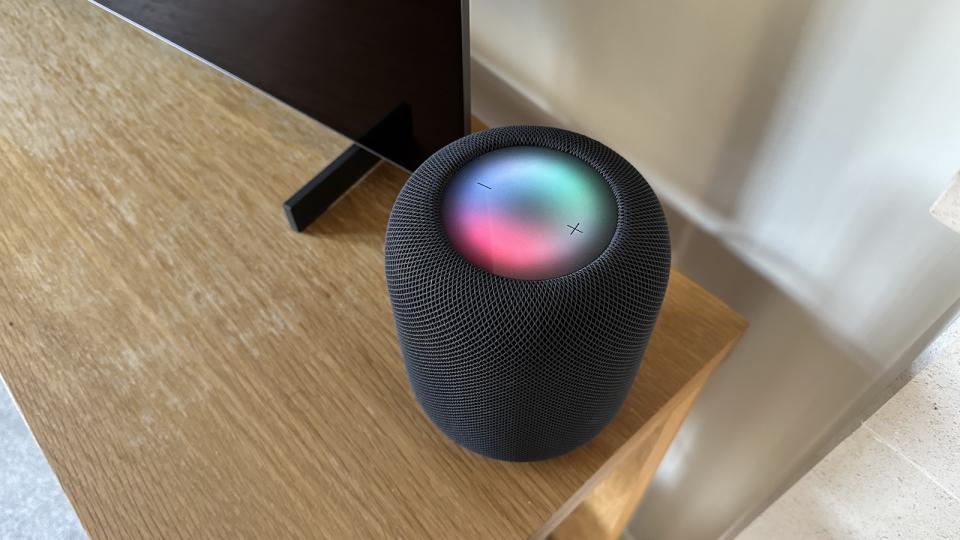 Apple HomePod 2 seen from above on a TV cabinet