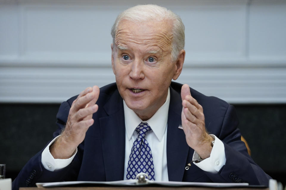 FILE - President Joe Biden speaks during a meeting with his "Investing in America Cabinet," in the Roosevelt Room of the White House, Friday, May 5, 2023, in Washington. Biden would veto a House GOP bill that aims to restrict asylum, build more border wall and cut a program that allows migrants a chance to stay in the U.S. lawfully for two years, an administration official said Monday, May 8. (AP Photo/Evan Vucci, File)