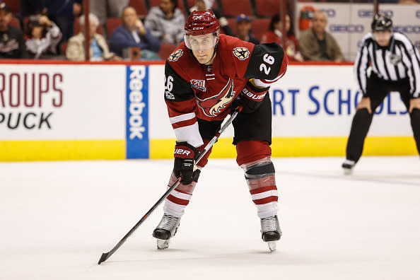 GLENDALE, AZ - JANUARY 23: Arizona Coyotes defenseman Michael Stone (26) gets ready for the face off during the NHL hockey game between the Florida Panthers and the Arizona Coyotes on January 23, 2017 at Gila River Arena in Glendale, Arizona.(Photo by Kevin Abele/Icon Sportswire via Getty Images)