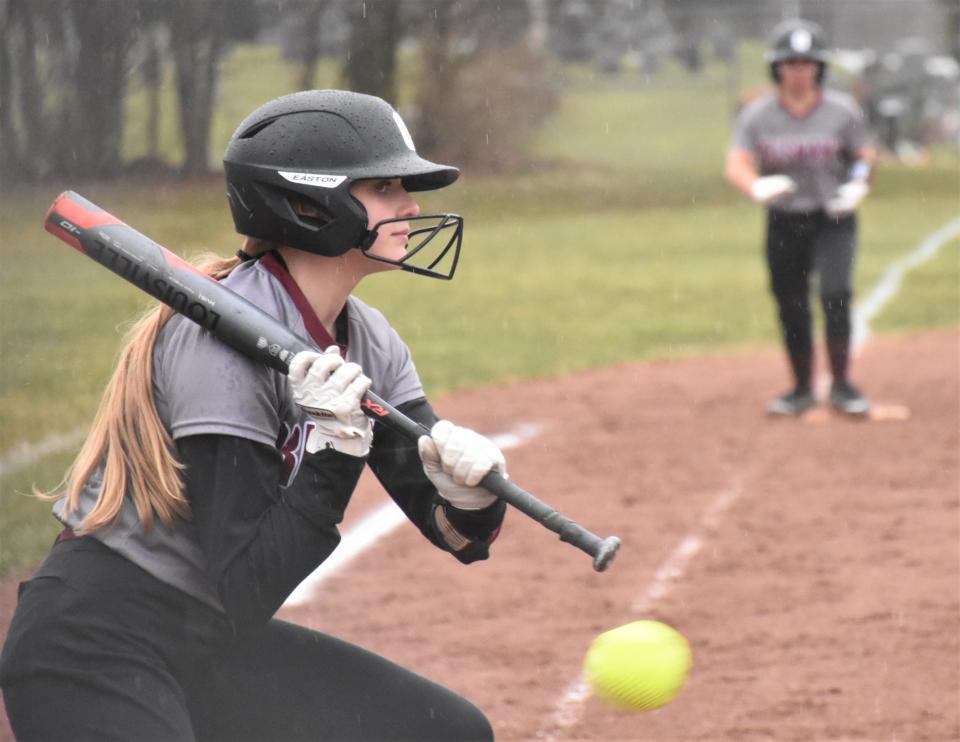 Oriskany batter Kaelyn Mayo pulls the bat back on a bluffed bunt with the go-ahead run at third base during Tuesday's game against Adirondack.