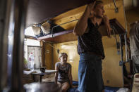 Internally displaced people board a train heading to Dnipro, at the Pokrovsk train station, Donetsk region, eastern Ukraine, Friday, July 8, 2022. (AP Photo/Nariman El-Mofty)