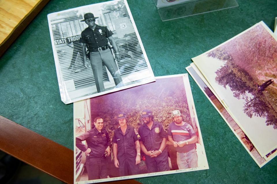 Photos from Alabama Law Enforcement Agency Capt. Tyrone Anderson's career are shown at the Levi Watkins Learning Center at Alabama State University in Montgomery on Jan. 31. Anderson was one of the first black Alabama State Troopers in 1972.