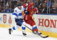 Sep 22, 2016; Toronto, Ontario, Canada; Team Finland forward Leo Komarov (71) collides with Team Russia defenseman Dmitry Orlov (9) during preliminary round play in the 2016 World Cup of Hockey at Air Canada Centre. Mandatory Credit: Dan Hamilton-USA TODAY Sports