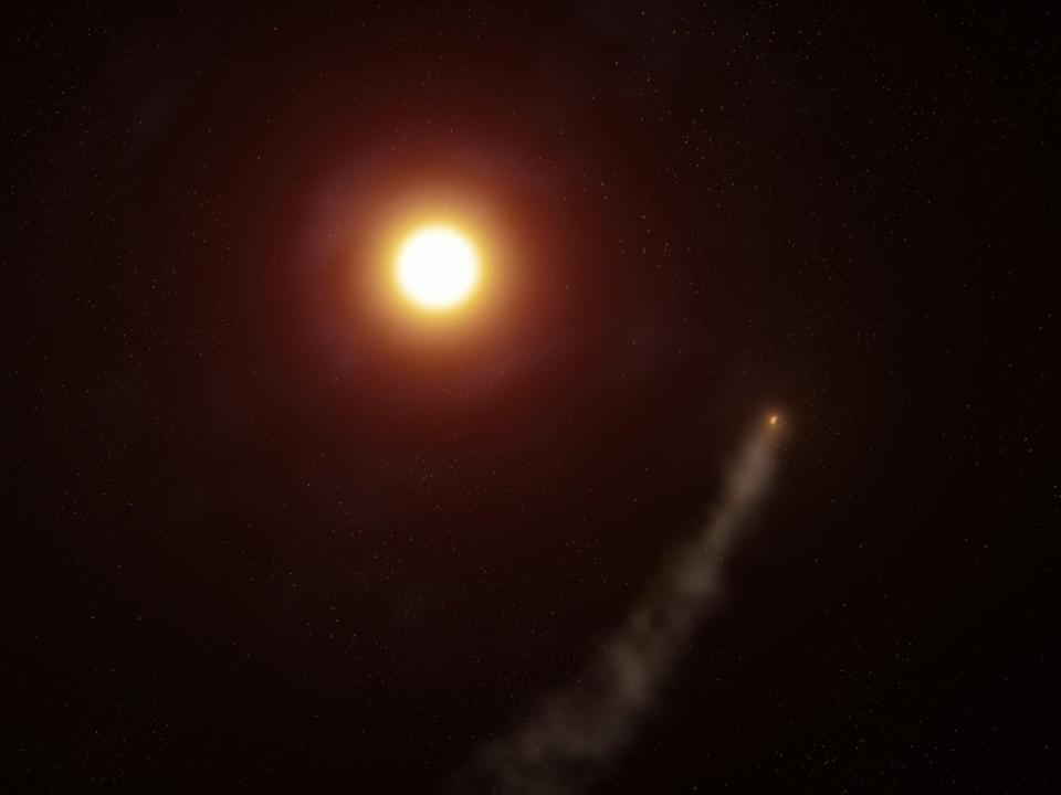 Eine künstlerische Darstellung von WASP-69b in der Umlaufbahn seines Sterns. Die sich ablösende Atmosphäre bildet einen kometenartigen Schweif hinter dem Planeten. - Copyright: W. M. Keck Observatory/Adam Makarenko