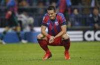 Steaua Bukarest's Florin Gardos reacts during their Champions League group E soccer match against Schalke 04 in Gelsenkirchen September 18, 2013. REUTERS/Ina Fassbender (GERMANY - Tags: SPORT SOCCER)