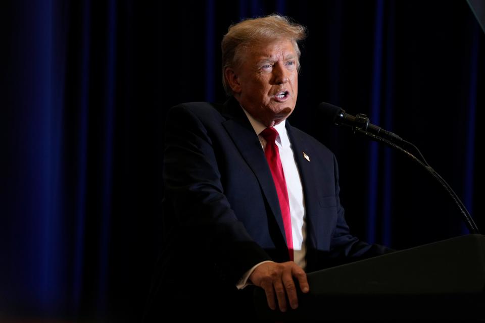 Former President Donald Trump speaks during a rally on Dec. 13, 2023, in Coralville, Iowa.