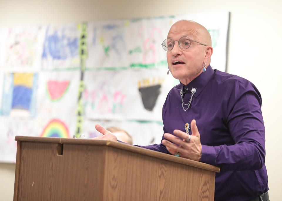 Canton artist Jonathan Becker was among the speakers at Monday's PFLAG event at the North Canton Library to support the LGBTQ+ community.