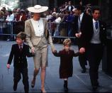<p>The Prince and Princess of Wales, with young Prince William and Harry at the wedding of Duke Hussey's daughter in Bath, May 1989. (Getty Images)</p> 