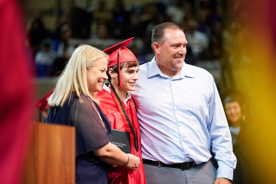 Jackson Eyre, seen here graduating from South Fort Myers High School this spring. Eyre is pictured with his Mom (Rachel) and Dad (Willie). Eyre died with four other teens when their car crashed late June 25 in a retention pond along Interstate 75 near Topgolf in Fort Myers. Their car was found submerged underwater the morning of June 26.