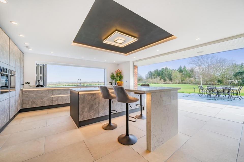 East Anglian Daily Times: The high-spec kitchen has bi-fold doors opening onto a large terrace