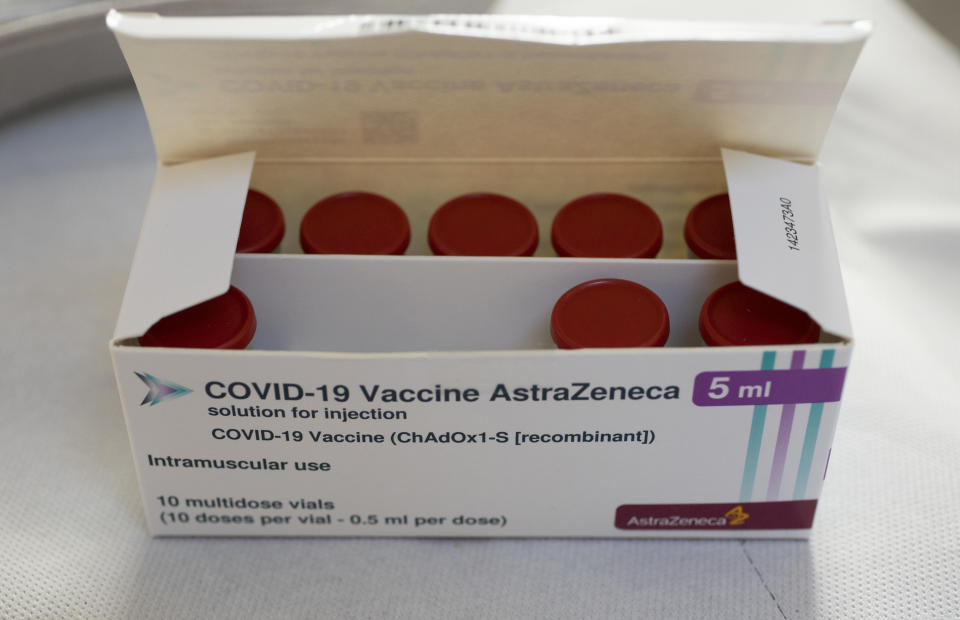 FILE - In this Wednesday, April 14, 2021 file photo, a box with vials of AstraZeneca vaccine against COVID-19 were taken out of a fridge for a few seconds during a vaccination campaign in Amsterdam, Netherlands, . The European Medicines Agency is expected to provide updated guidance Friday April 23, 2021, on how countries across Europe should use the coronavirus vaccine developed by AstraZeneca. (AP Photo/Peter Dejong, File)