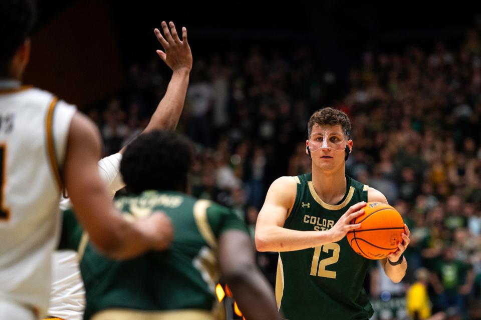 Colorado State's Patrick Cartier looks to pass during a game against Wyoming at Moby Arena in Fort Collins, Colo., on Saturday, March 2, 2024.