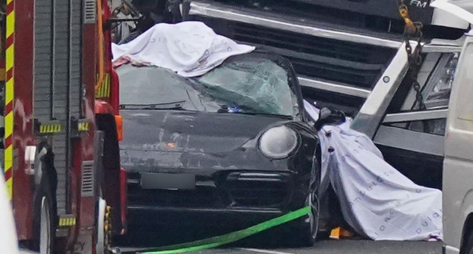 A Porsche pictured at the scene of the Melbourne freeway crash that also killed Senior Constable Lynette Taylor, Senior Constable Kevin King and Constable Josh Prestney.