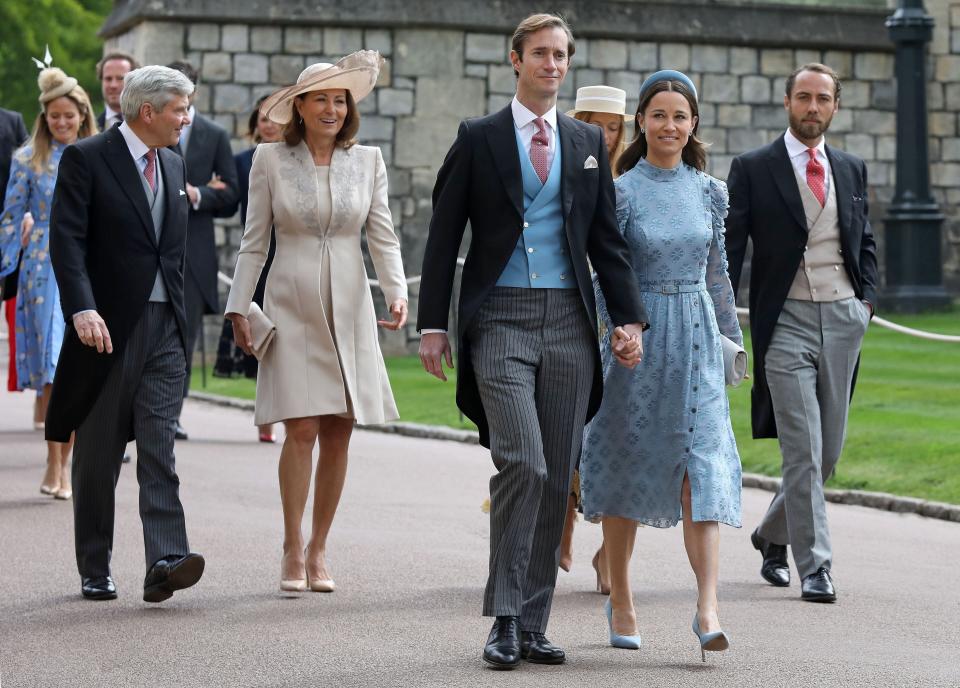 (L-R) Michael and Carole Middleton, James Matthews, Pippa Middleton and James Middleton arrive at St George's Chapel in Windsor Castle, Windsor, west of London, on May 18, 2019, to attend the wedding of Lady Gabriella Windsor to Thomas Kingston. - Lady Gabriella, is the daughter of Prince and Princess Michael of Kent. Prince Michael, is the Queen Elizabeth II's cousin. (Photo by Steve Parsons / POOL / AFP)        (Photo credit should read STEVE PARSONS/AFP/Getty Images)