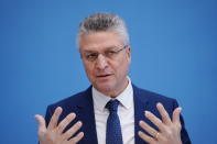 Lothar H. Wieler, President of the Robert Koch Institute (RKI), gives a press conference on developments in the Corona pandemic at the Federal Press Conference in Berlin, Germany, Friday, Dec. 3, 2021. (Kay Nietfeld/dpa via AP)