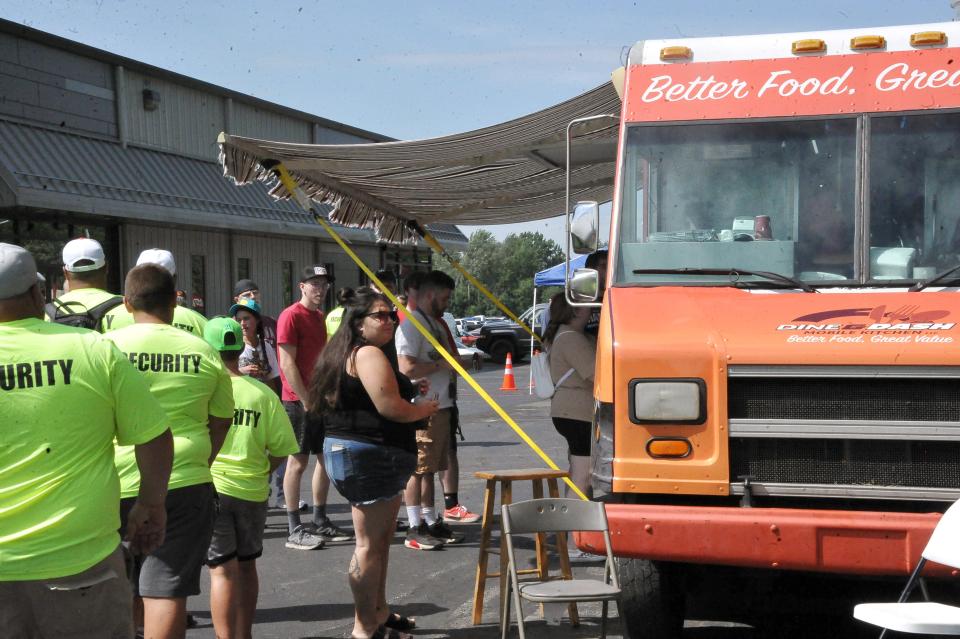 The food trucks and tents were a big draw at the NASCAR event at Jarrett Logistics.