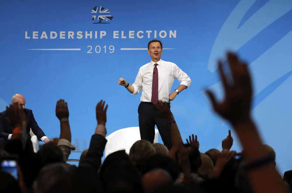 Conservative party leadership candidate Jeremy Hunt takes questions during a Conservative leadership hustings at ExCel Centre in London, Wednesday, July 17, 2019. The two contenders, Jeremy Hunt and Boris Johnson are competing for votes from party members, with the winner replacing Prime Minister Theresa May as party leader and Prime Minister of Britain's ruling Conservative Party. (AP Photo/Frank Augstein)