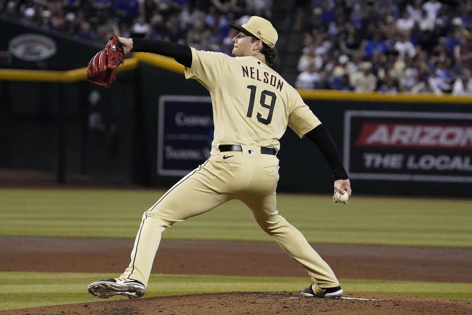 Arizona Diamondbacks starting pitcher Ryne Nelson throws against the Chicago Cubs during the second inning of a baseball game Sunday, Sept. 17, 2023, in Phoenix. (AP Photo/Darryl Webb)