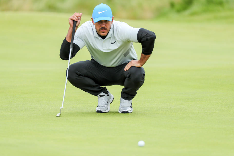 Brooks Koepka apparently didn't snub Tiger Woods on purpose. He just changed his phone number.