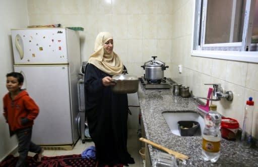 "We have a garden, the streets are nice." Aitaf Awda, 58, says her family's lives have been transformed by their Qatari-built apartment in the impoverished Gaza city of Khan Yunis