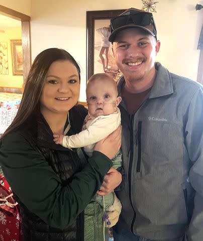 <p>Danielle Wiebusch</p> Danielle and Hunter Wiebusch with their daughter Hallie