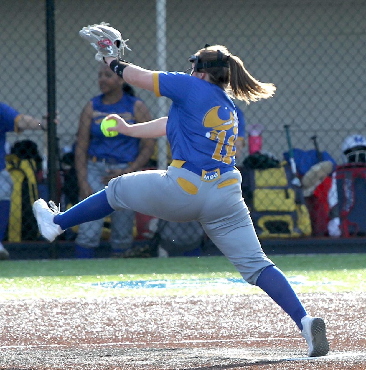 Mitchell's Page Mullis (11) goes through her windup.