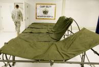 GUANTANAMO BAY, CUBA - MAY 09: (IMAGE REVIEWED BY U.S. MILITARY PRIOR TO TRANSMISSION) Portable beds that are used to for detainee's who are feed with a feeding tube sit in a room in the hospital for detainee's at Camp Delta May 9, 2006 in Guantanamo Bay, Cuba. There are currently three detainee's who refuse to eat and are fed with a feeding tube twice a day. Camp Delta was first occupied on April 28, 2002, when 300 detainees previously held at Camp X-Ray were transferred to Camp Delta. The rest of the detainees were moved on April 29. Camp X-Ray closed down on that same day. (Photo by Mark Wilson/Getty Images)