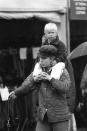 <p>Princess Anne carries her daughter Zara, 2, on her shoulders at the Burghley Horse Trials back in 1983 [Photo: PA Images] </p>