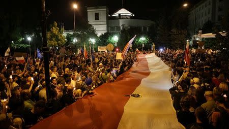 People protest against the Supreme Court legislation in Warsaw, Poland, July 20, 2017. Agencja Gazeta/Agata Grzybowska/via REUTERS