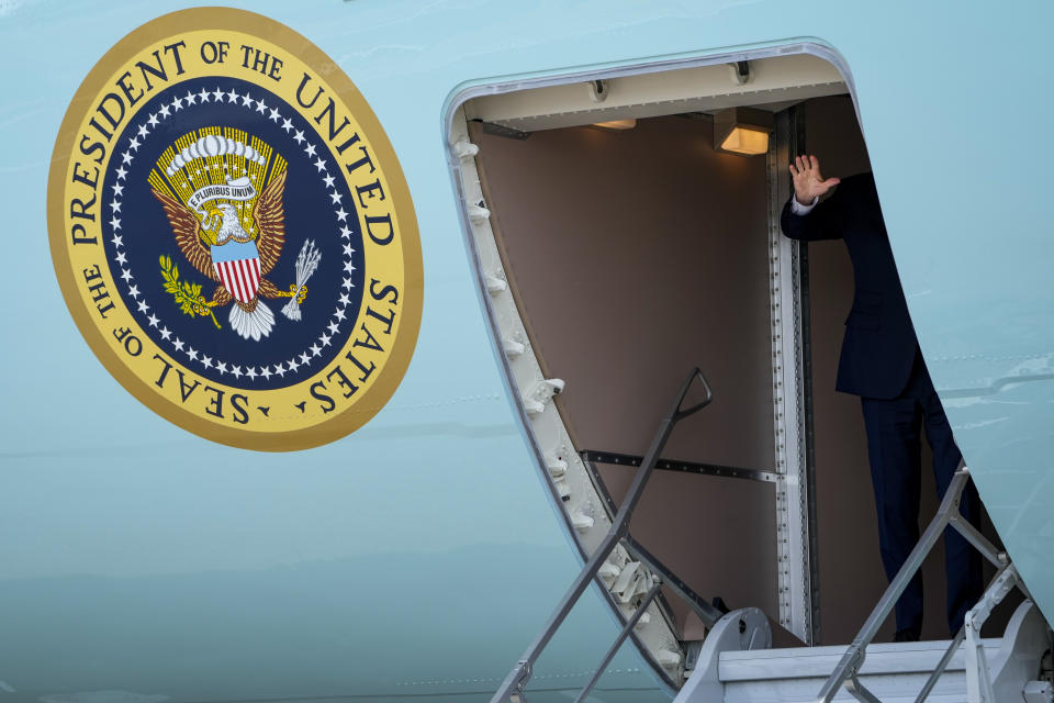 US President Joe Biden waves after boarding Air Force One at Stansted airport, in London, Monday, July 10, 2023. (AP Photo/Susan Walsh)