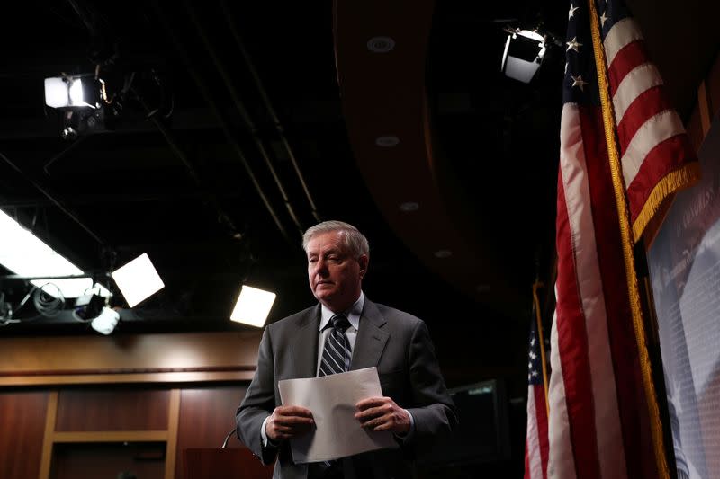 U.S. Senator Graham (R-SC) departs following a press conference on Capitol Hill in Washington