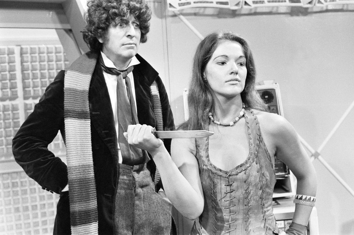 Doctor Who, actor Tom Baker - the 4th Doctor - pictured with new assistant Leela played by actress Louise Jameson, the Doctors first alien companion 26th October 1976. (Photo by Freddie Reed/Mirrorpix/Getty Images)