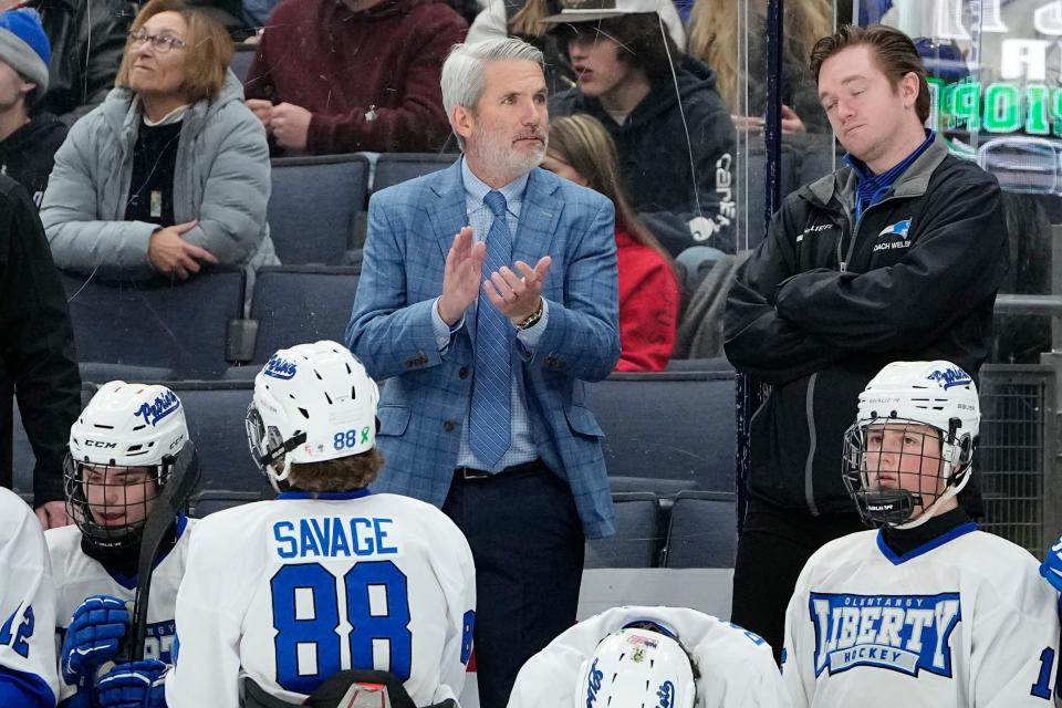 Olentangy Liberty hockey coach Kevin Alexander, here leading his team in a 2023 state semifinal, has been placed on leave by Olentangy Schools.