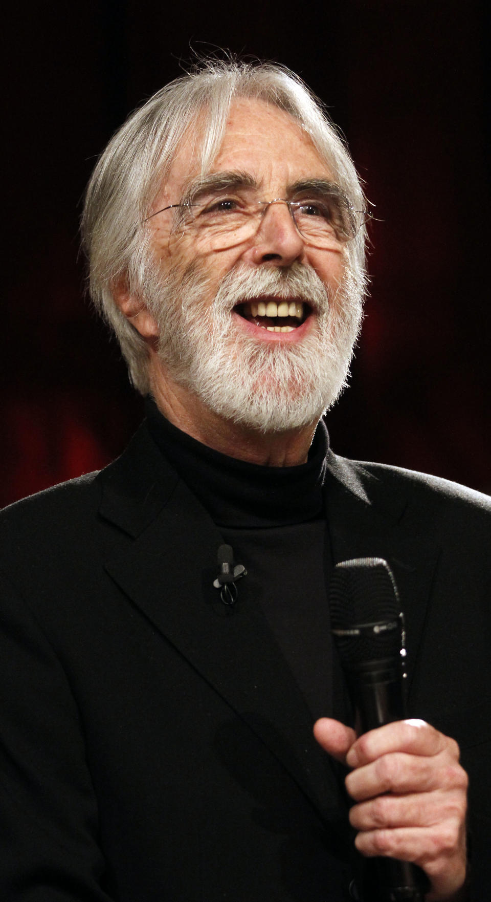 Austrian director Michael Haneke speaks during a presentation of humanistic aging research in Vienna, Austria, Wednesday, March 20, 2013. (AP Photo/Ronald Zak)