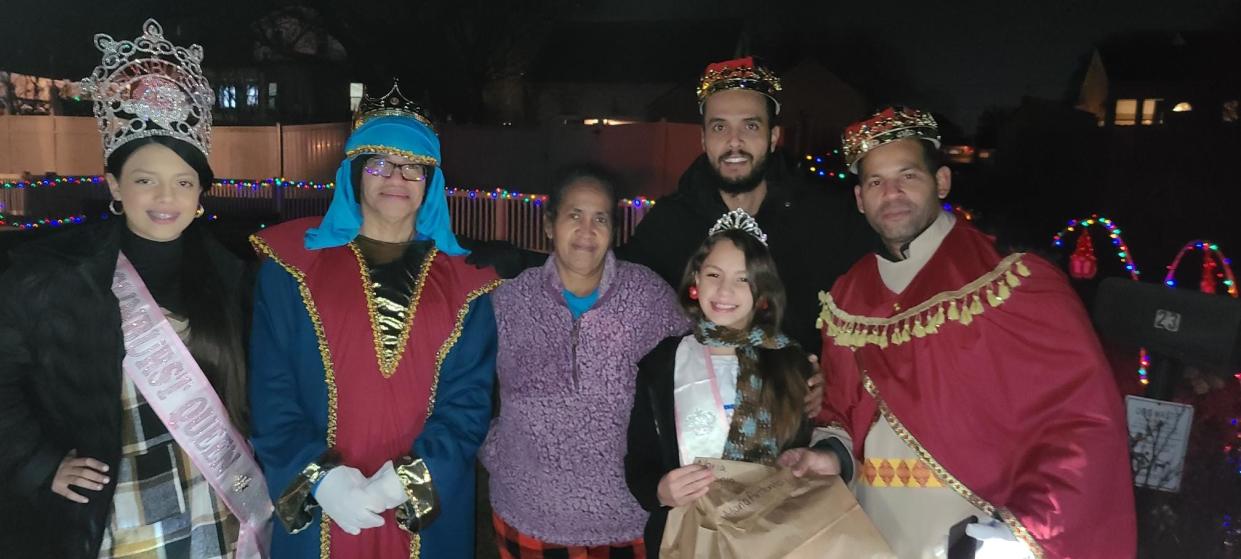 A group from WEPA along with the three kings, two beauty queens and a group of carolers visited 17 homes Friday night to deliver presents and spread holiday joy.