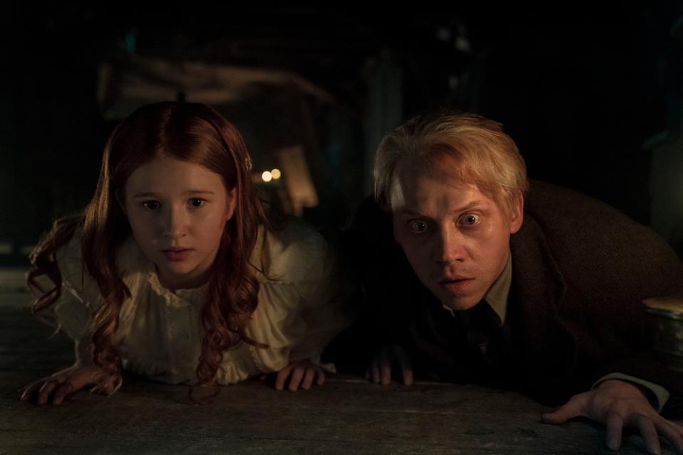 Daphne Hoskins and Rupert Grint in “Cabinet of Curiosities” - Credit: Ken Woroner / Netflix